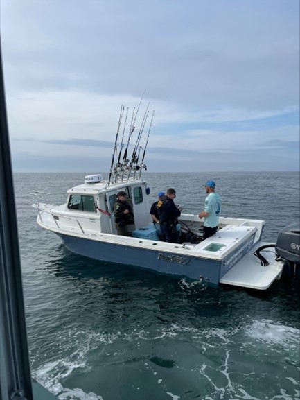 ECO Kortz and National Marine Fisheries Service Officers board vessel on the Atlantic Ocean fo...jpg