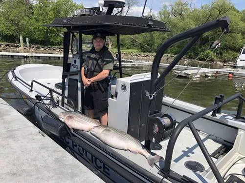 ECO Wamsley with seized striped bass.webp