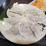 Pork and scallions dumplings.webp